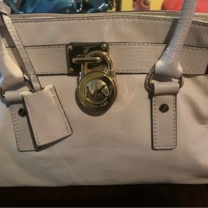 Michael Kors Cream, white leather bag.. With Gold hardware.